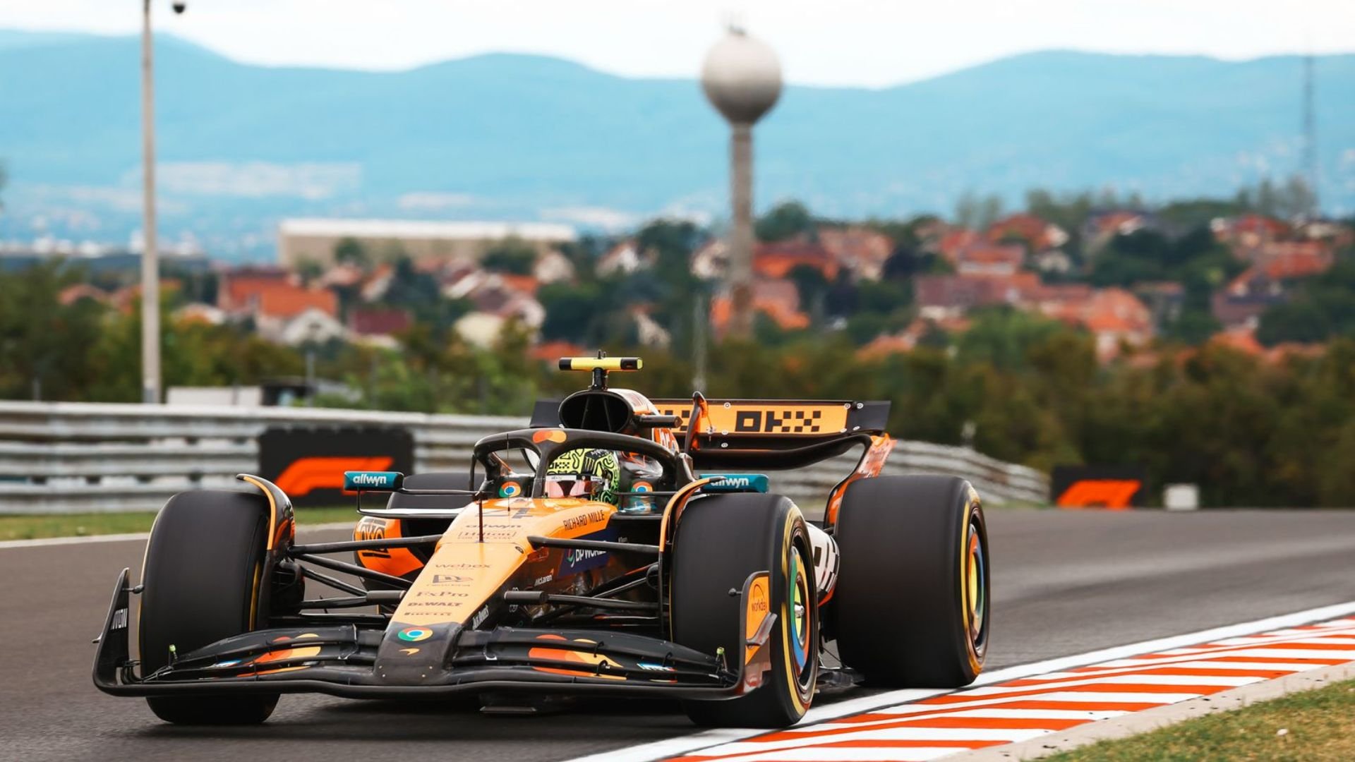 Lando Norris defends against Oscar Piastri to take Hungarian Grand Prix victory